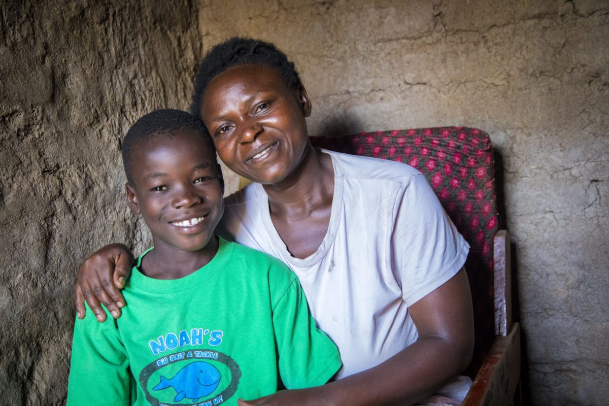Image of Ugandan woman and child from series breaking the cycle reclaiming hope and belonging for tooth leaving institutional care in uganda